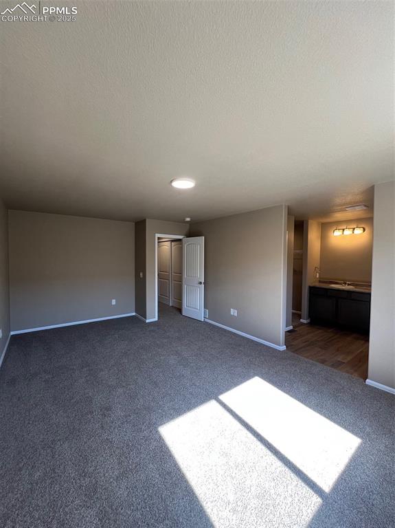 1874 Sandtoft Heights Colorado Springs, CO 80951 - Photo 23 of 31 an empty room with an entrance to other room