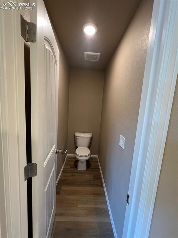 1874 Sandtoft Heights Colorado Springs, CO 80951 - Photo 27 of 31 a bathroom with a sink and a toilet