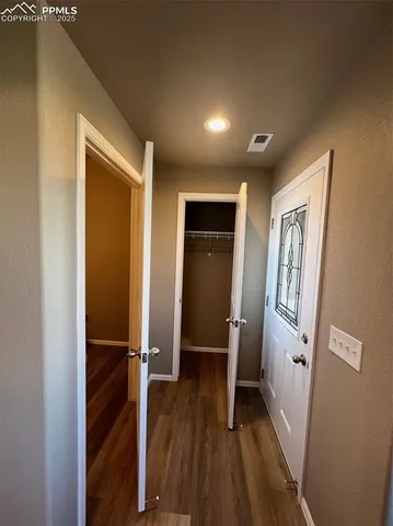 a living room with stainless steel appliances kitchen island granite countertop furniture and a kitchen view