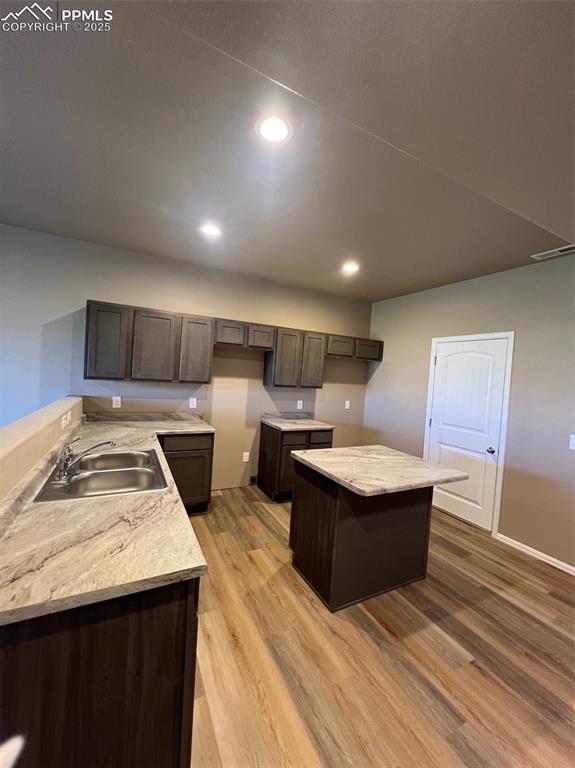 1874 Sandtoft Heights Colorado Springs, CO 80951 - Photo 6 of 31 a living room with stainless steel appliances kitchen island granite countertop furniture and a kitchen view