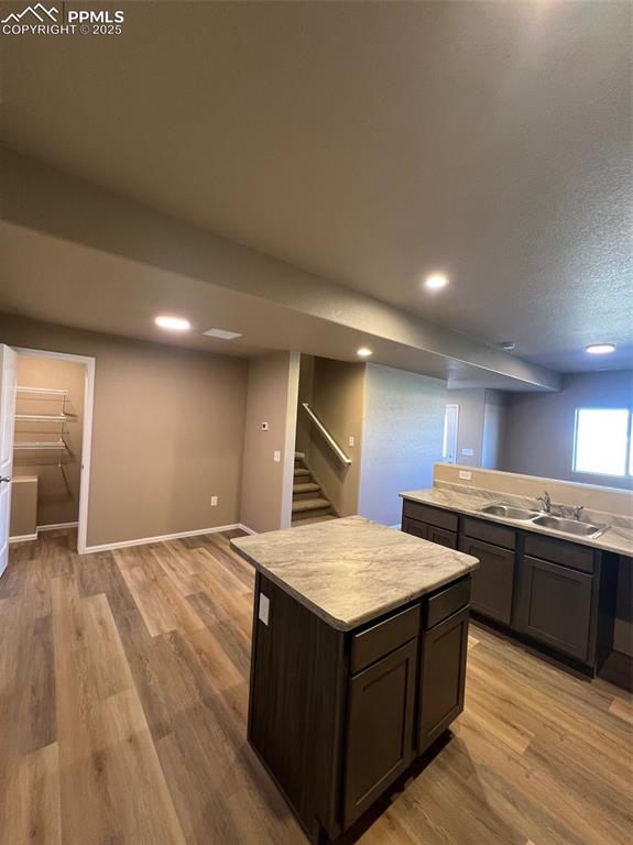 1874 Sandtoft Heights Colorado Springs, CO 80951 - Photo 8 of 31 a kitchen with stainless steel appliances granite countertop a stove and a sink