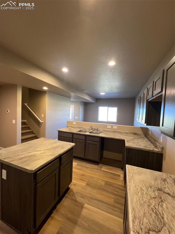 1874 Sandtoft Heights Colorado Springs, CO 80951 - Photo 9 of 31 a large kitchen with a large counter top and kitchen