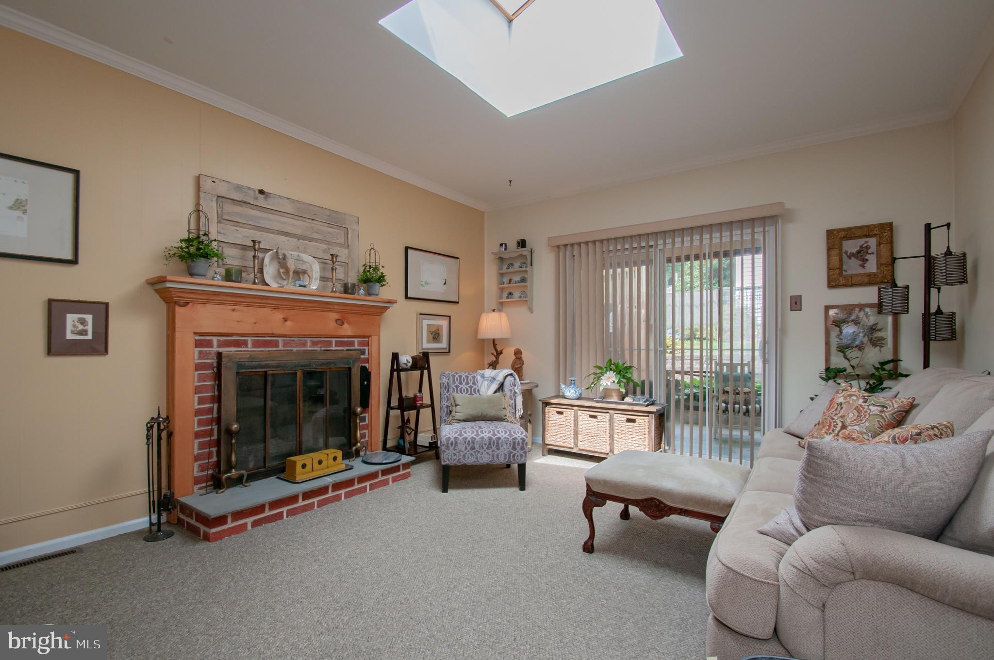 517 Faraday Road Hockessin, DE 19707 - Photo 10 of 18 Family room with door leading to screened in porch
