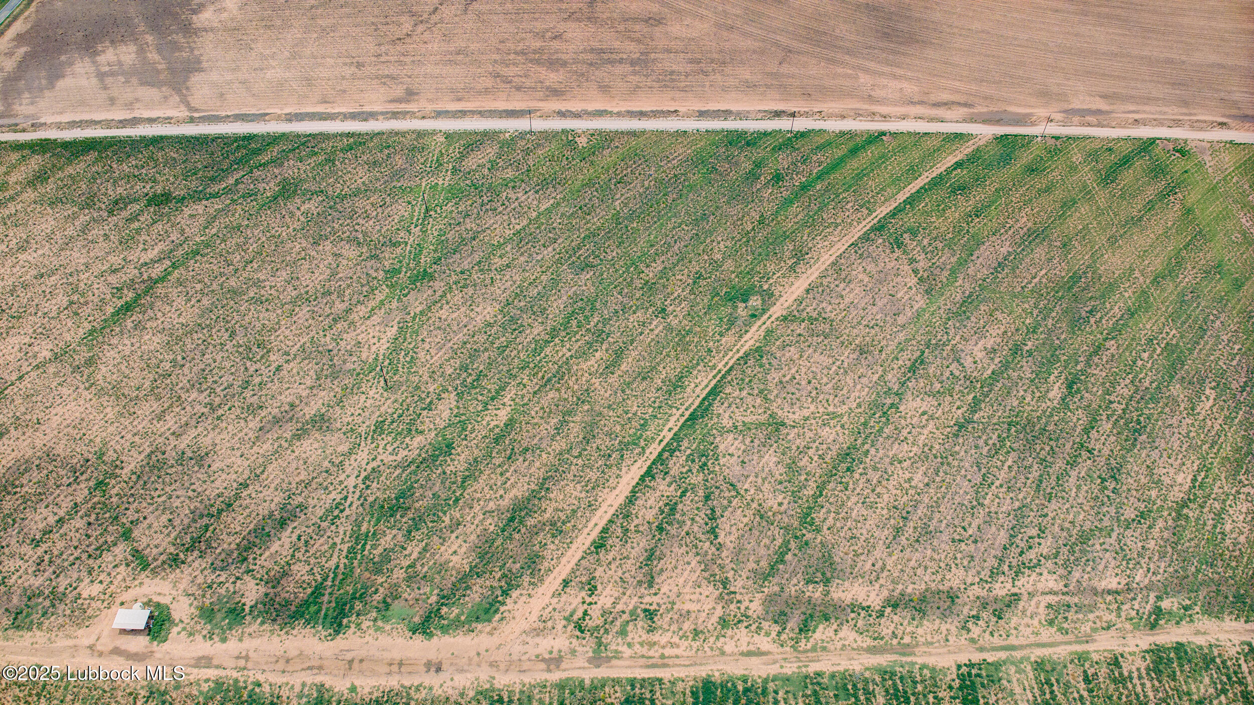 27 Woodrow Slaton, TX 79364 - Photo 6 of 12 DJI_20250611150954_0026_D_27_D_28_D_29_D