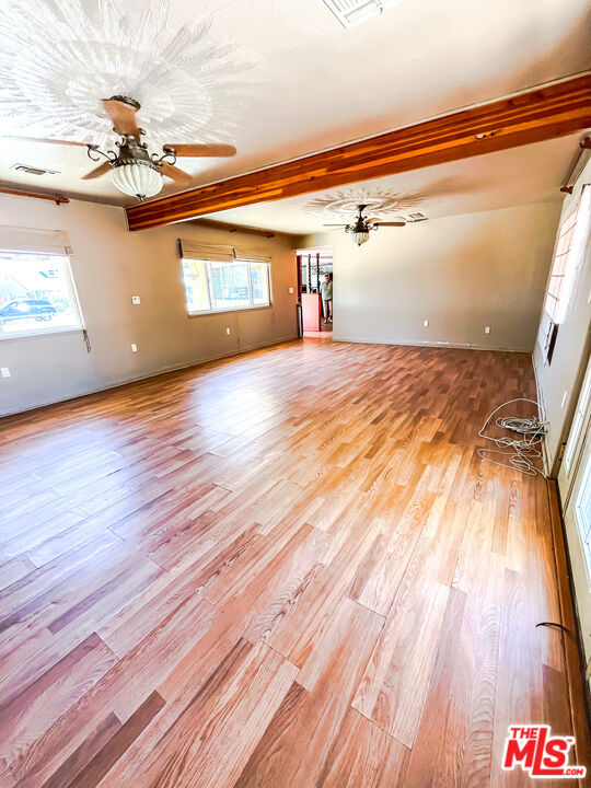 1001 South McCall Street Ridgecrest, CA 93555 - Photo 12 of 27 a view of a room with wooden floor