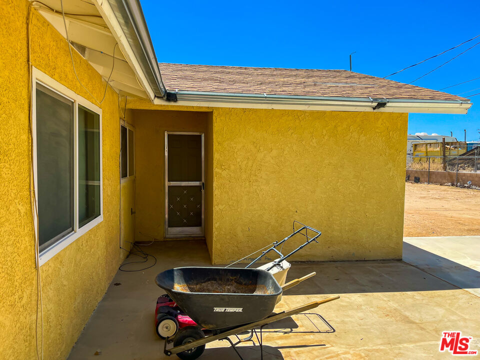 1001 South McCall Street Ridgecrest, CA 93555 - Photo 24 of 27 a front view of a house with entryway