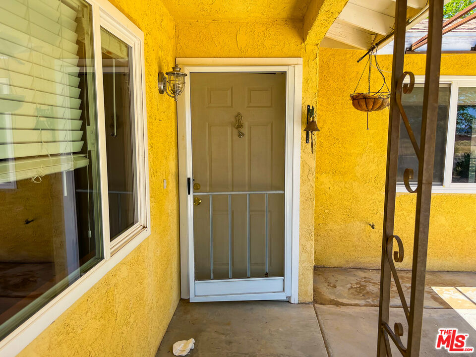 1001 South McCall Street Ridgecrest, CA 93555 - Photo 3 of 27 a view of a door