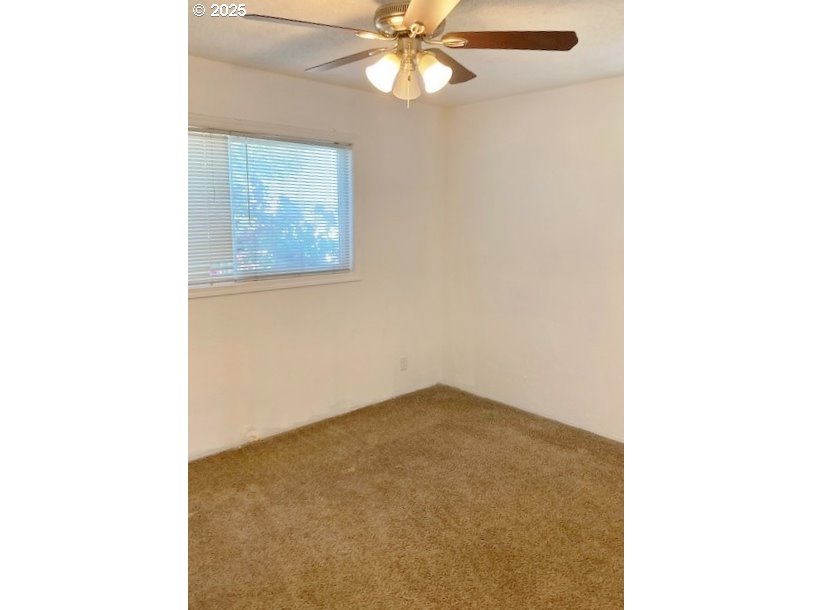 727 Southwest 28th Street Pendleton, OR 97801 - Photo 9 of 12 a view of an empty room with a window