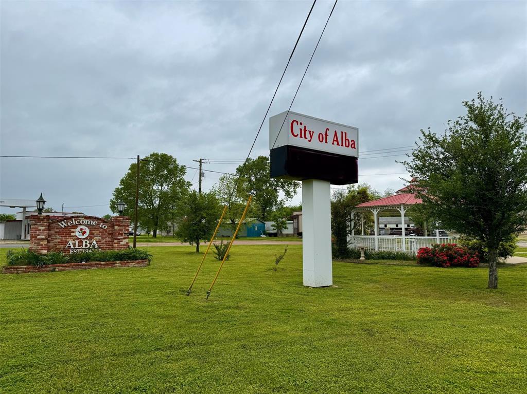 Lot 6 Rains County Road 2610 Alba, TX 75410 - Photo 15 of 16 a front view of a building with garden