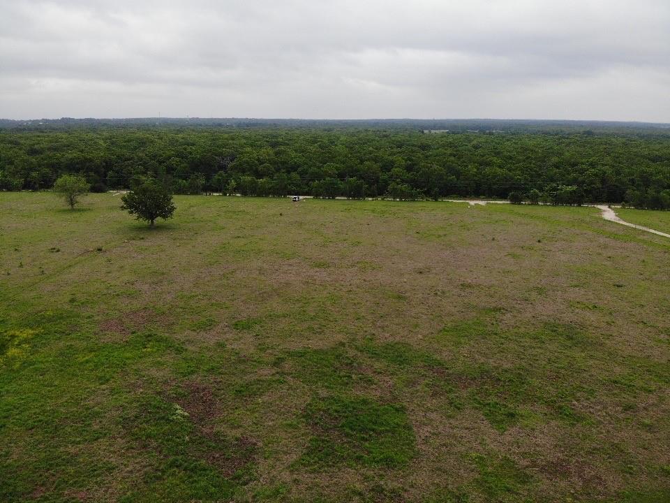 Lot 6 Rains County Road 2610 Alba, TX 75410 - Photo 9 of 16 a view of a lake with a yard
