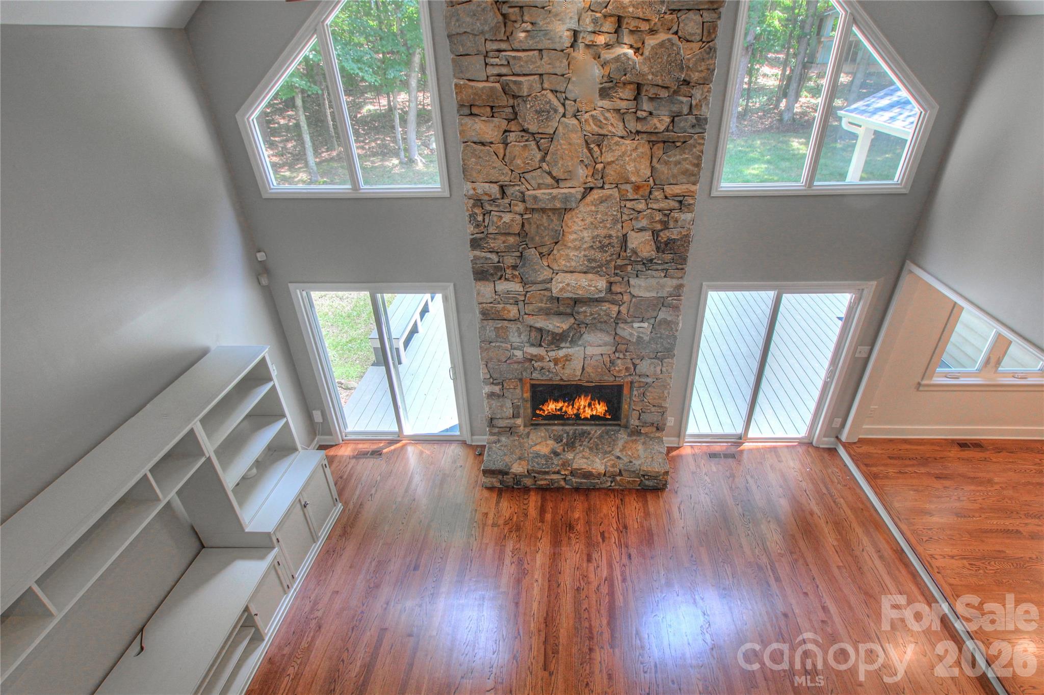 3408 Providence Manor Road Charlotte, NC 28270 - Photo 18 of 39 a living room with furniture and a fireplace