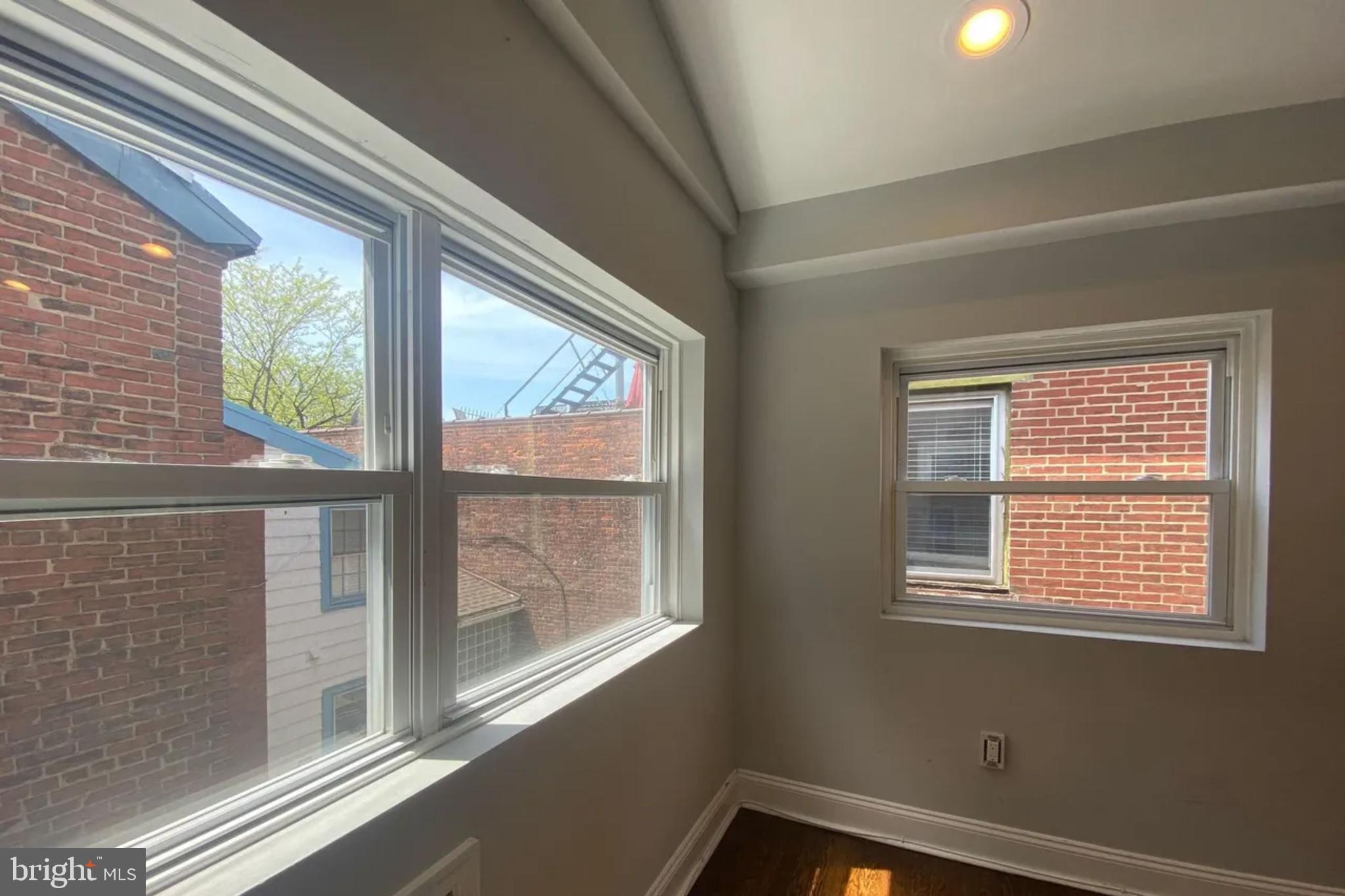 1616 Spruce Street, Unit 3R Philadelphia, PA 19103 - Photo 8 of 9 a view of a room that has a window in it