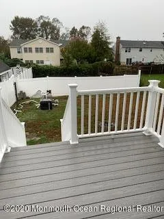 a view of balcony with furniture