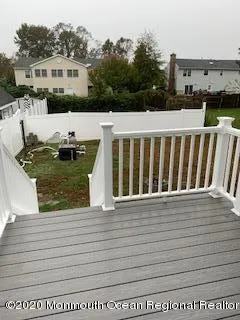 a view of balcony with furniture