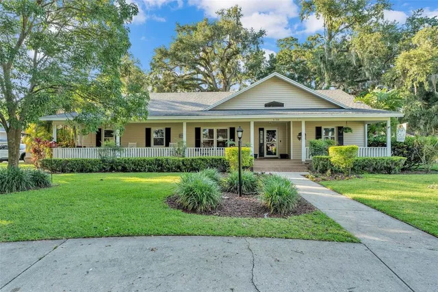 front view of a house and a yard