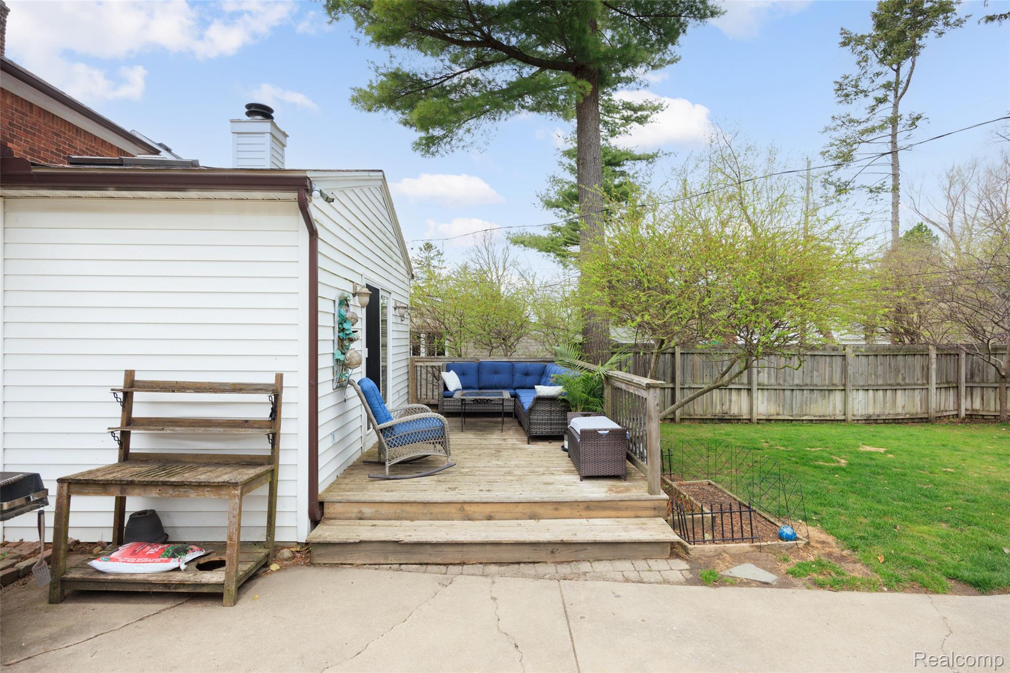 244 Kerby Road Grosse Pointe, MI 48236 - Photo 41 of 53 Wooden deck with an outdoor lounge area