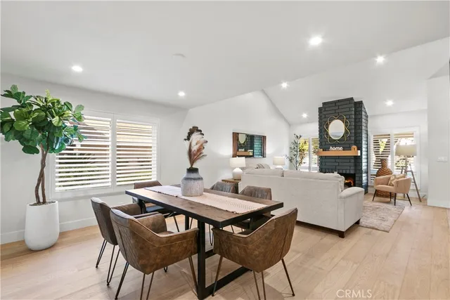 a view of a dining room with furniture and window