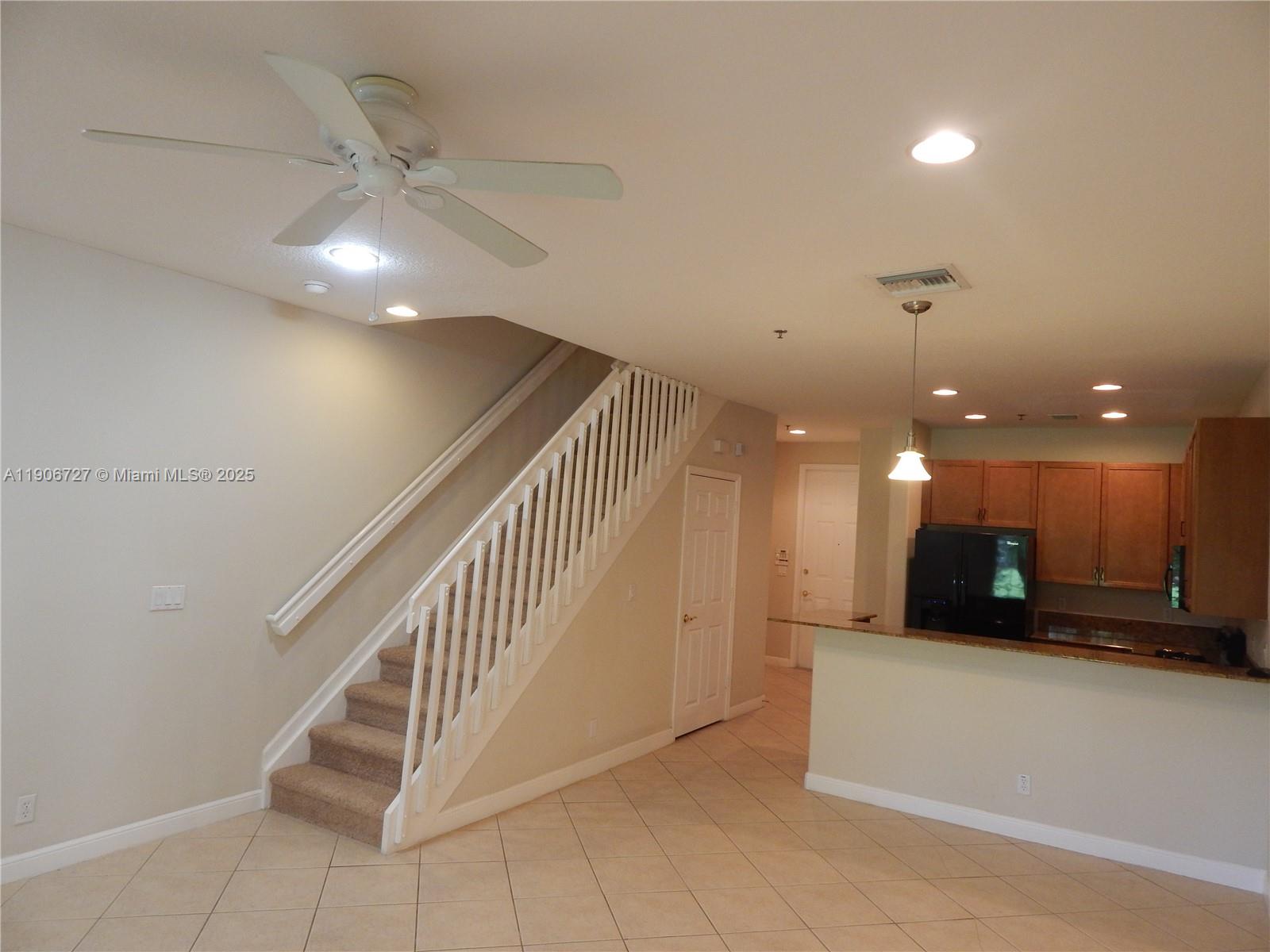 4622 Southwest 75th Way, Unit 102 Davie, FL 33314 - Photo 3 of 16 a view of a building stairs