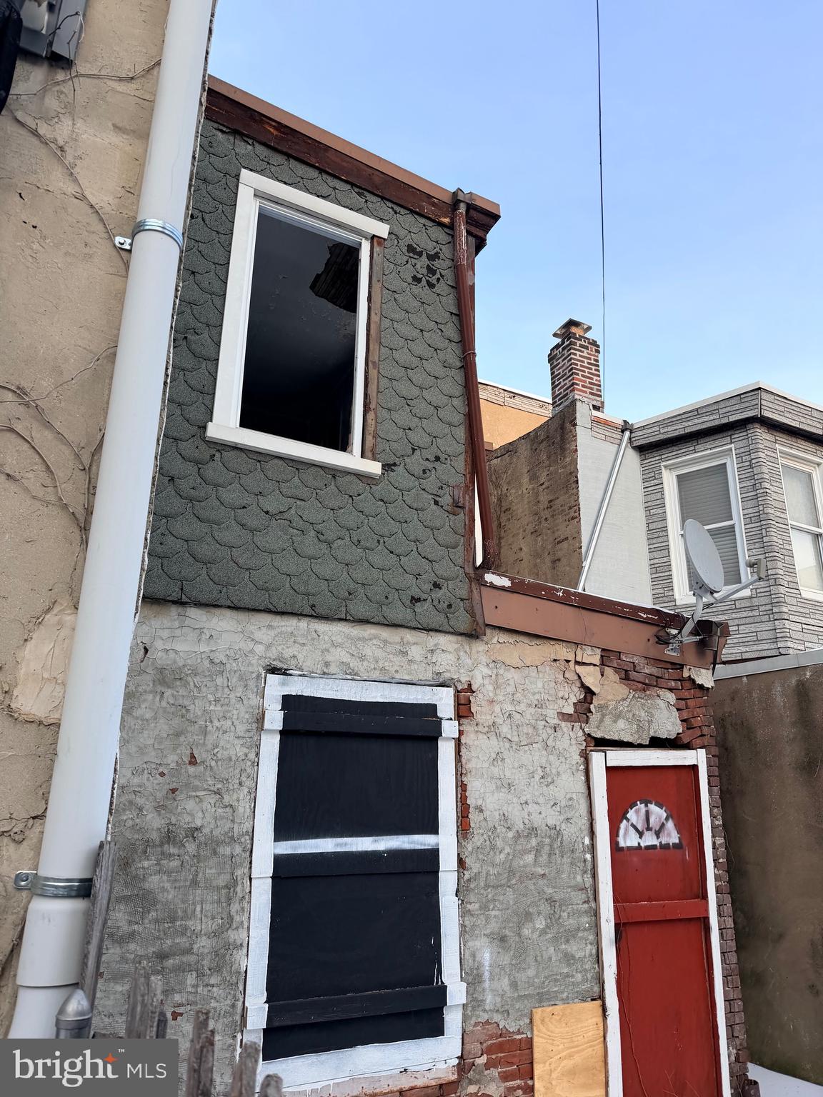 2716 East Lehigh Avenue Philadelphia, PA 19125 - Photo 7 of 7 a front view of a house with a door