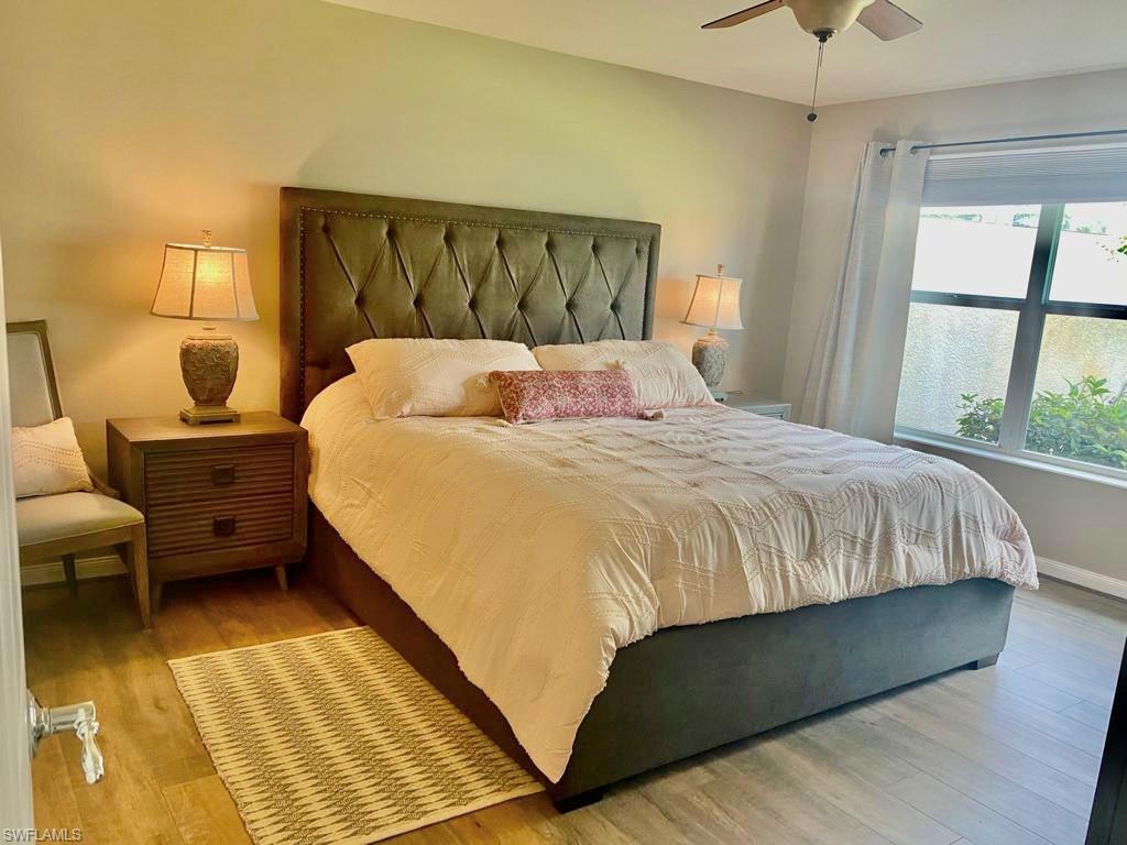 7310 Salerno Court Naples, FL 34114 - Photo 16 of 46 Primary Bedroom - looks out to Lake