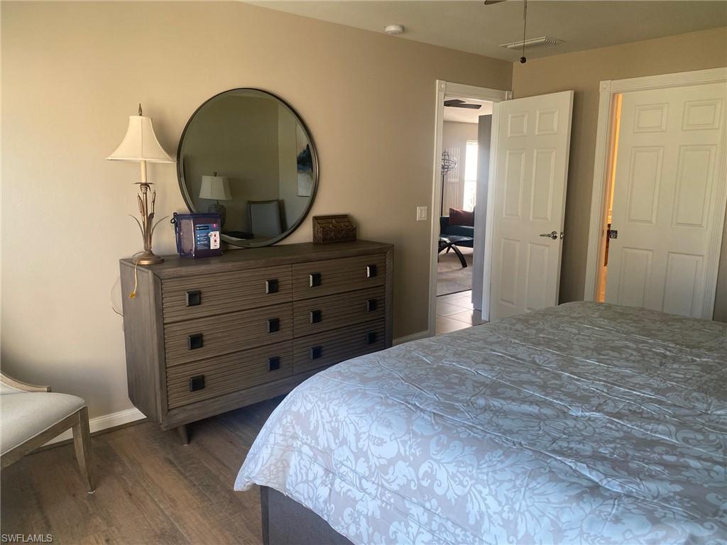 7310 Salerno Court Naples, FL 34114 - Photo 20 of 46 Primary Bedroom with King-size bed