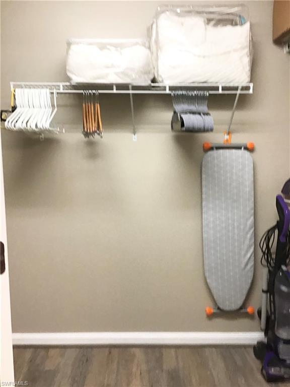 7310 Salerno Court Naples, FL 34114 - Photo 24 of 46 Primary Bedroom Walk-In Closet