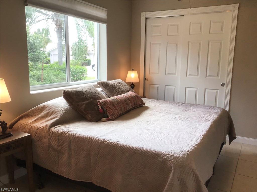 7310 Salerno Court Naples, FL 34114 - Photo 30 of 46 Second Guest Bedroom with French Doors