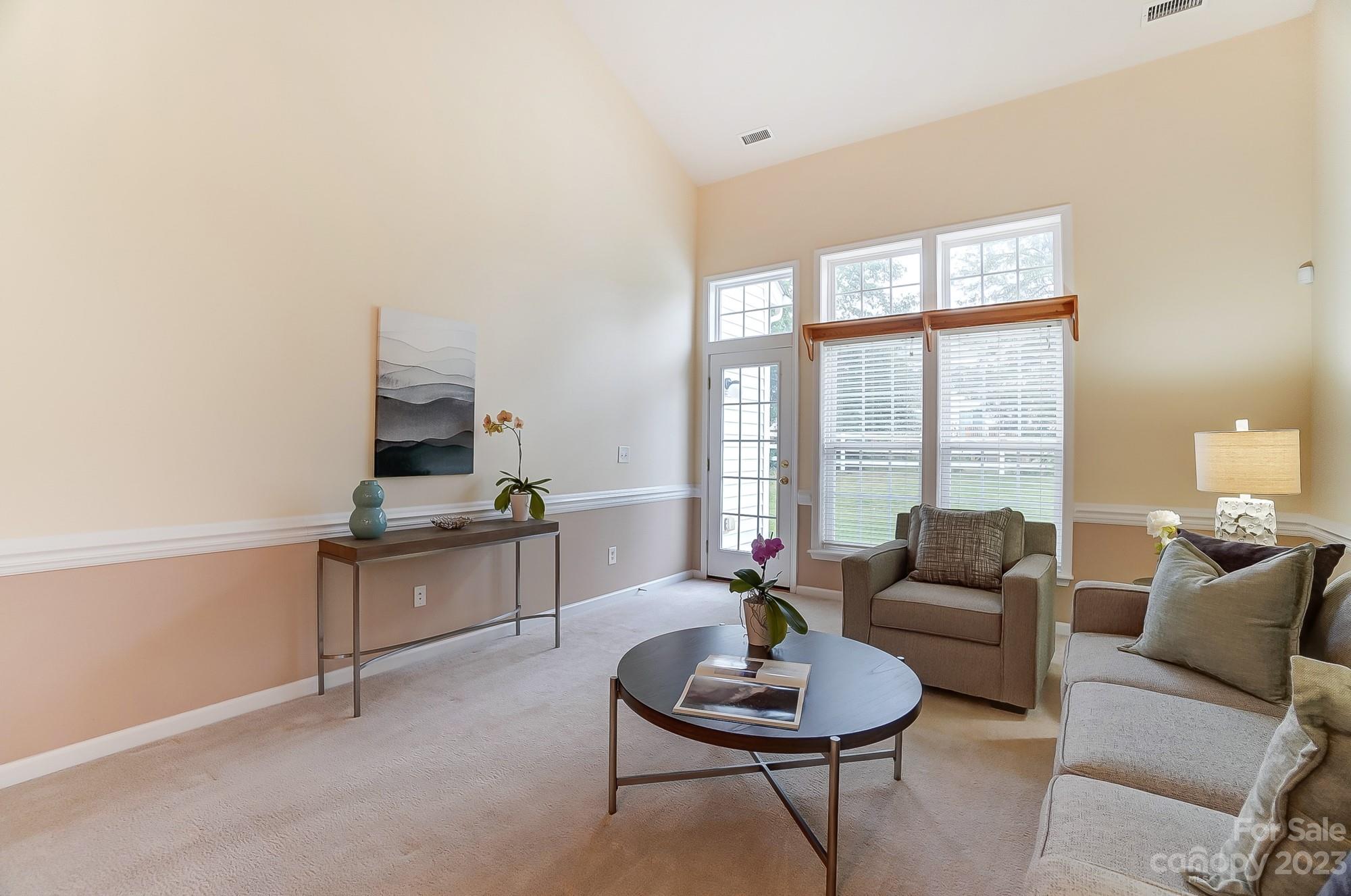 179 Snead Road Fort Mill, SC 29715 - Photo 11 of 48 a living room with furniture and a large window