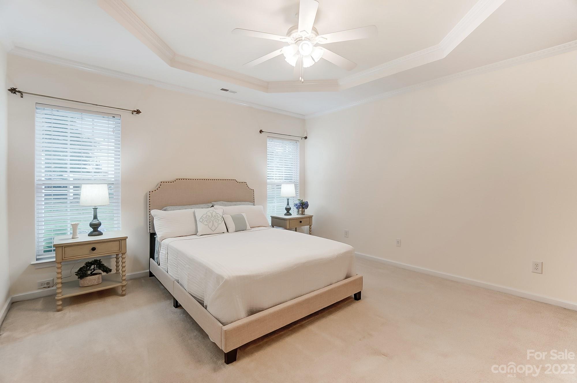 179 Snead Road Fort Mill, SC 29715 - Photo 13 of 48 a bedroom with a bed and a table in it