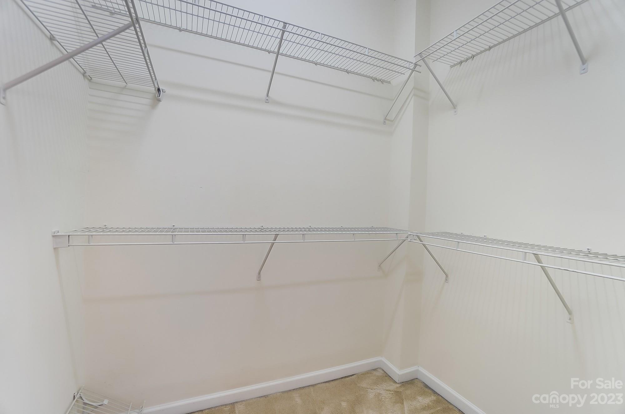 179 Snead Road Fort Mill, SC 29715 - Photo 18 of 48 a view of a room with racks on the wall