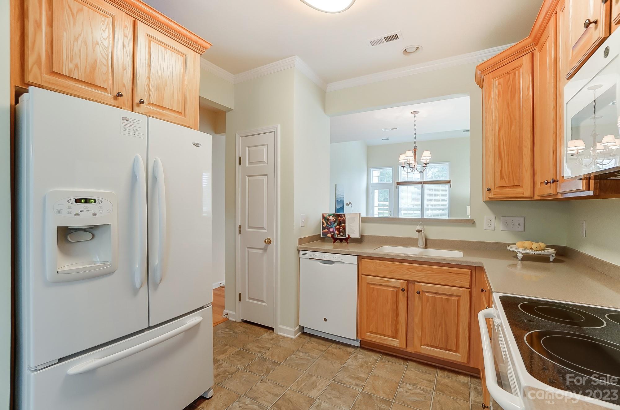 179 Snead Road Fort Mill, SC 29715 - Photo 22 of 48 a kitchen with stainless steel appliances a refrigerator sink and cabinets