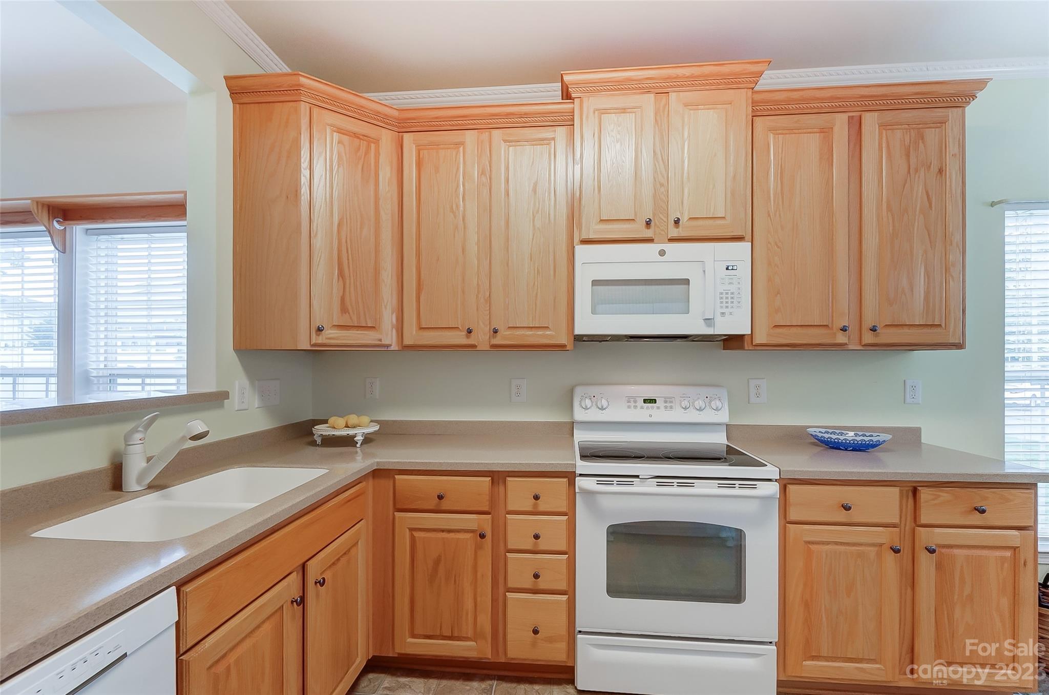 179 Snead Road Fort Mill, SC 29715 - Photo 23 of 48 a kitchen with stainless steel appliances granite countertop white cabinets sink and dishwasher