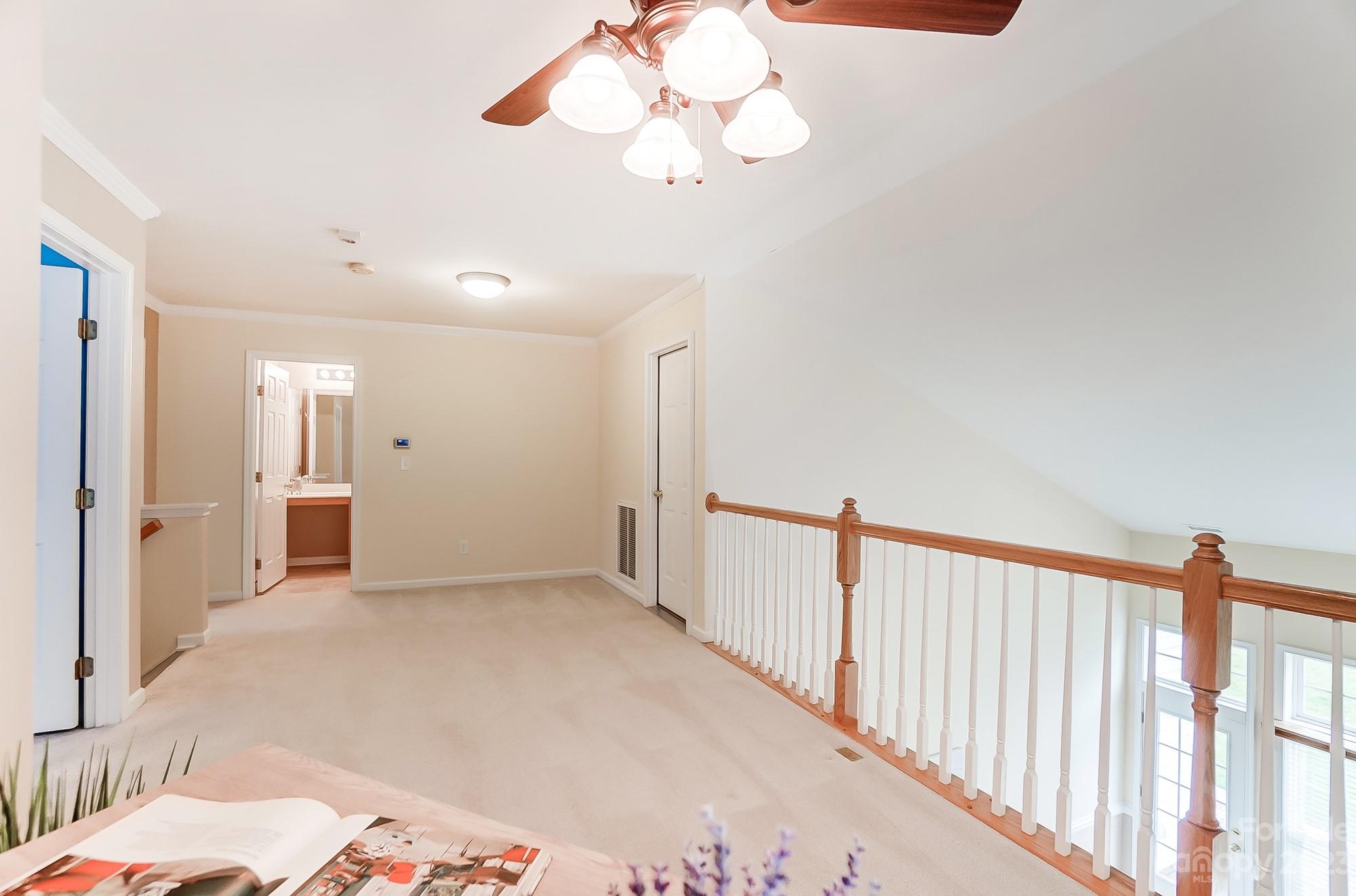 179 Snead Road Fort Mill, SC 29715 - Photo 28 of 48 a view of a bedroom with wooden floor