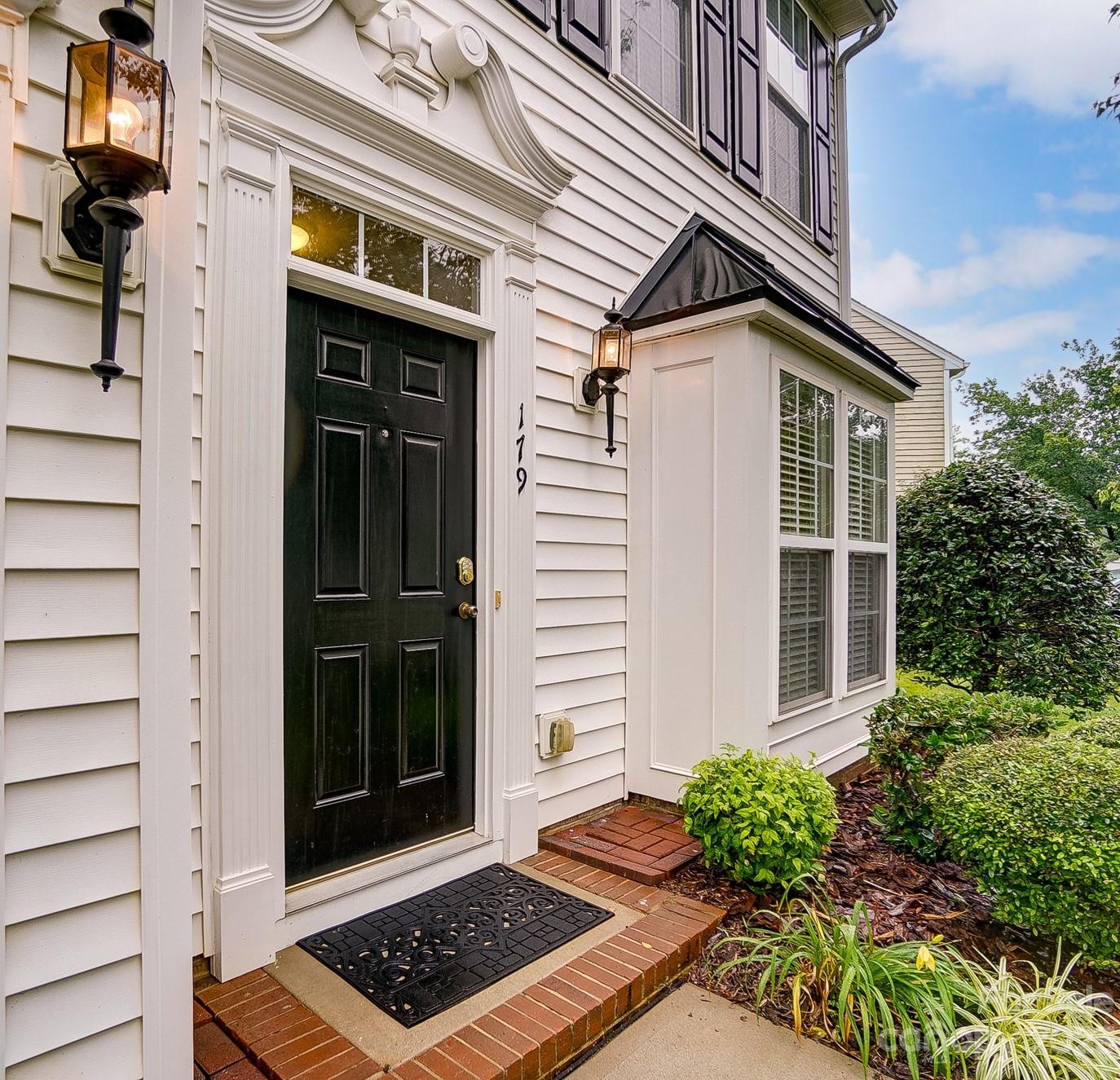 179 Snead Road Fort Mill, SC 29715 - Photo 3 of 48 a front view of a house with a yard