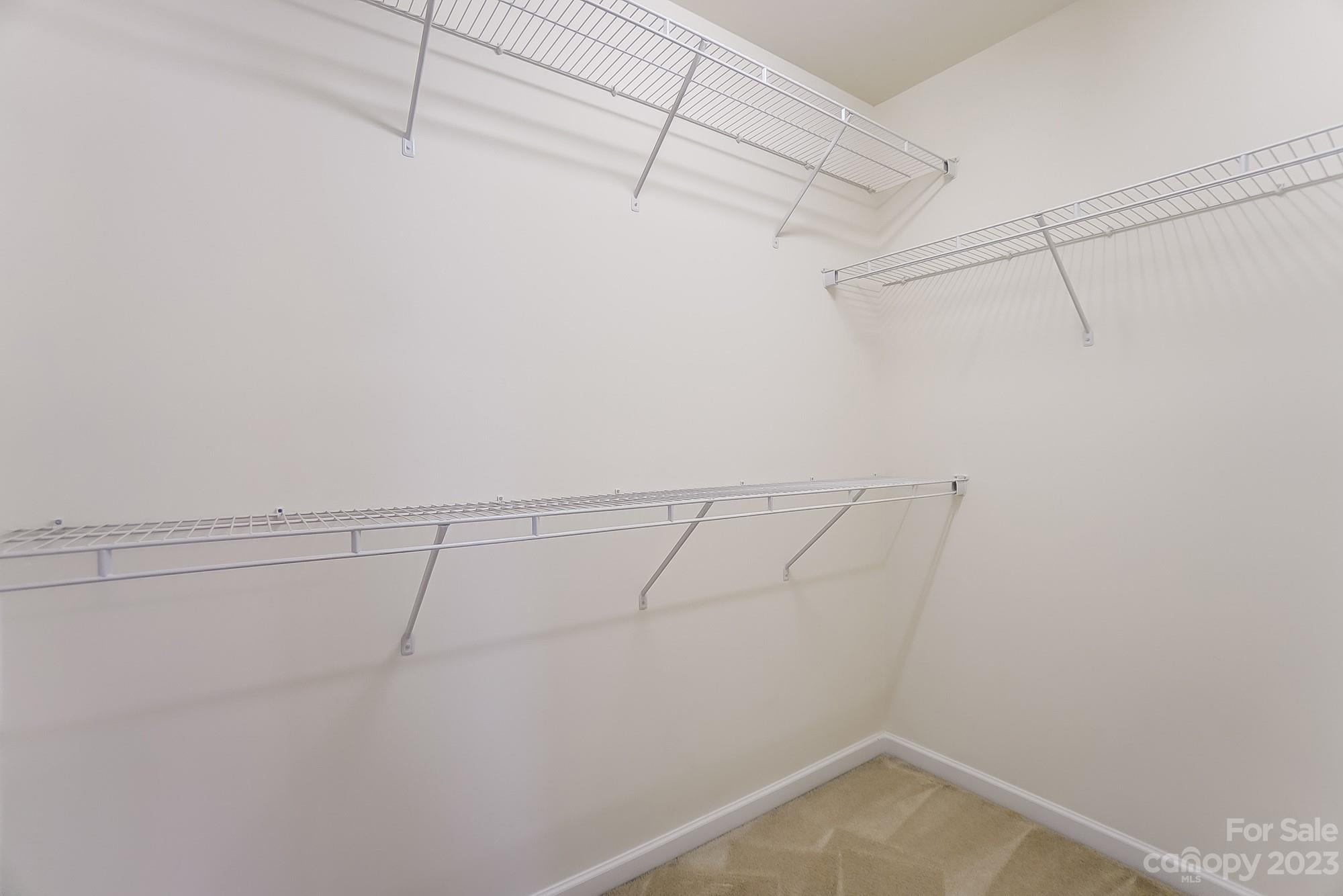 179 Snead Road Fort Mill, SC 29715 - Photo 38 of 48 a view of a room with racks on the wall