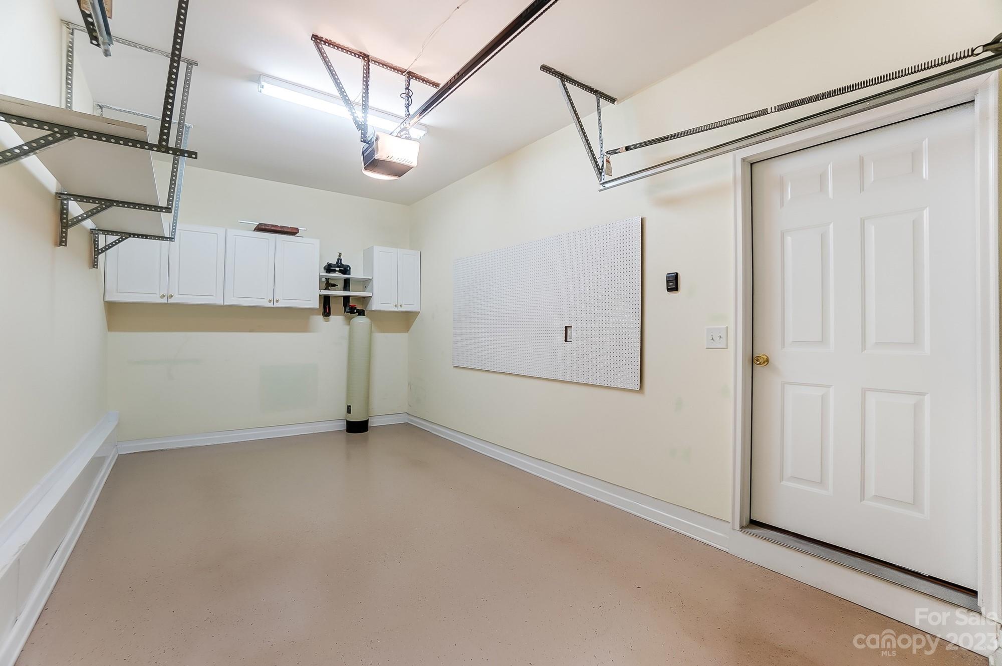 179 Snead Road Fort Mill, SC 29715 - Photo 40 of 48 a view of a storage & utility room with wooden floor