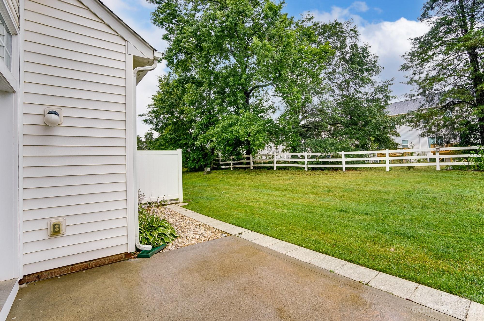 179 Snead Road Fort Mill, SC 29715 - Photo 44 of 48 a view of a patio with a yard