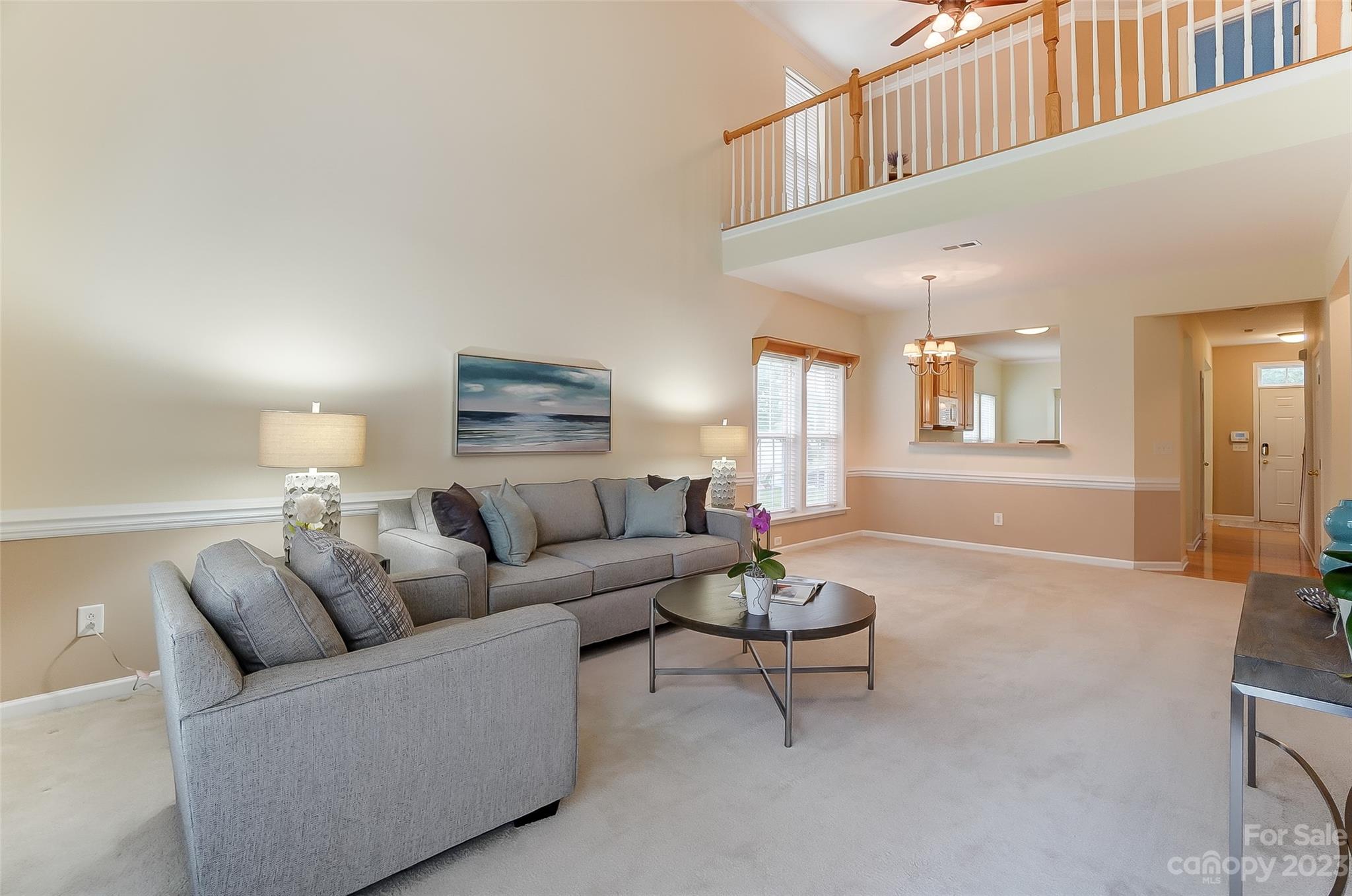179 Snead Road Fort Mill, SC 29715 - Photo 7 of 48 a living room with furniture and a wooden floor