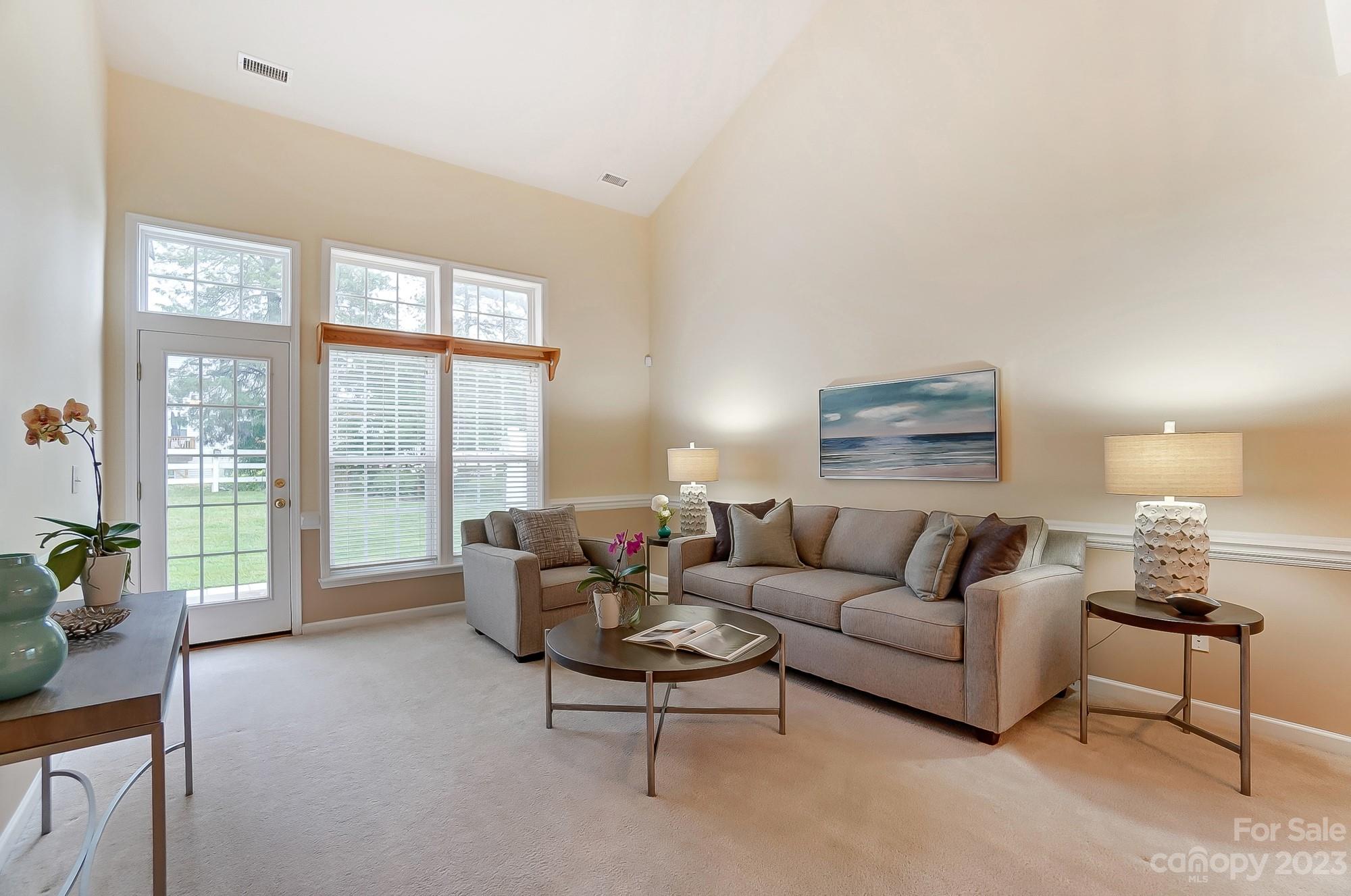 179 Snead Road Fort Mill, SC 29715 - Photo 8 of 48 a living room with furniture and a large window