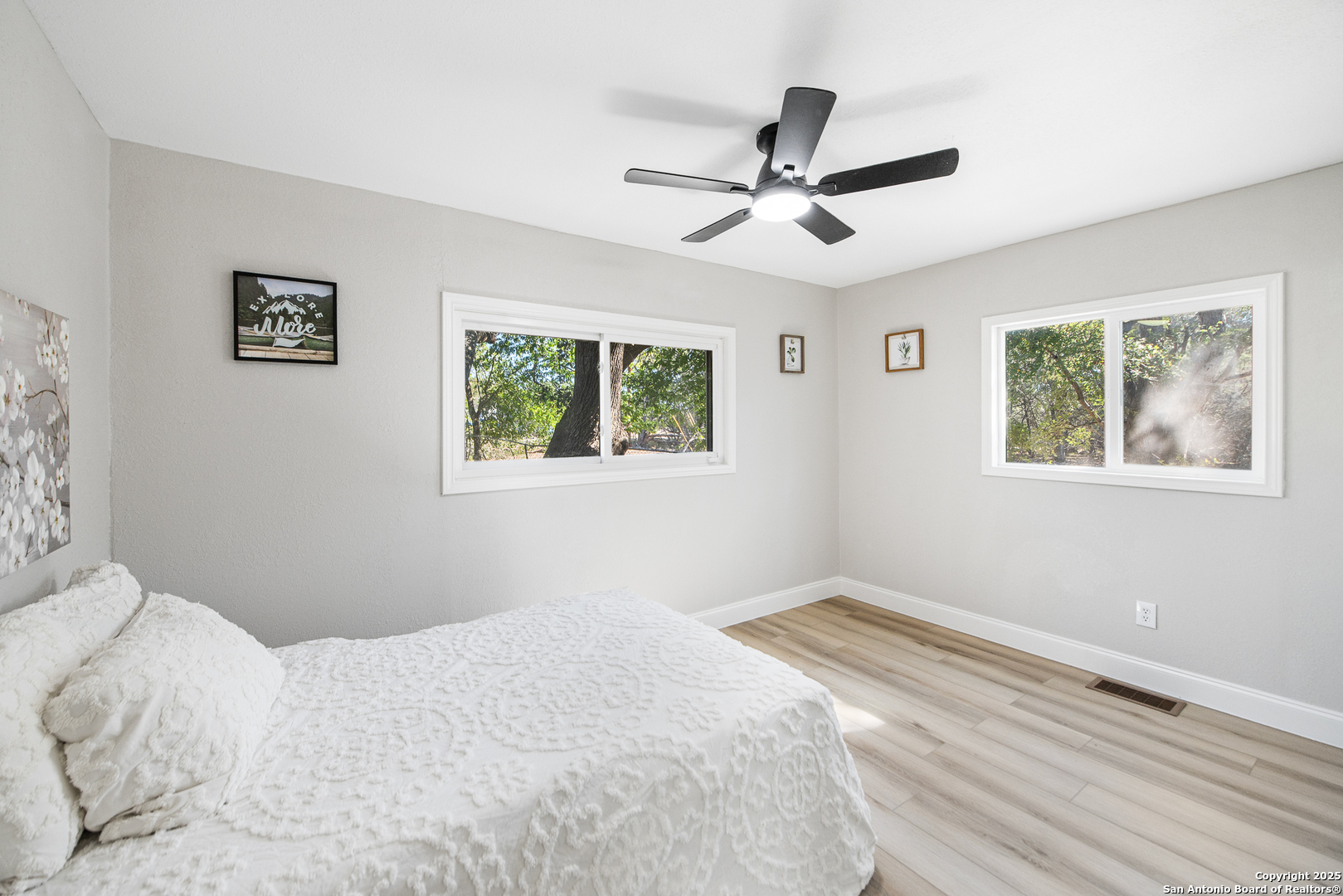 1230 Echo Meadow Lane Spring Branch, TX 78070 - Photo 16 of 31 a bedroom with bed and window