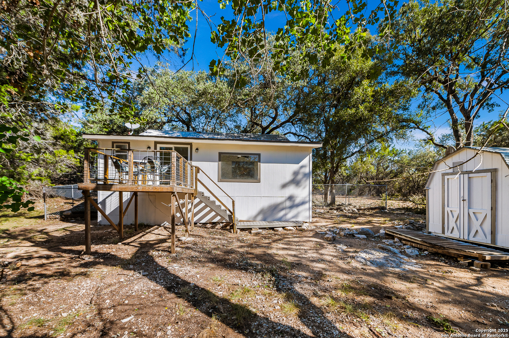 1230 Echo Meadow Lane Spring Branch, TX 78070 - Photo 21 of 31 a view of a house with a yard