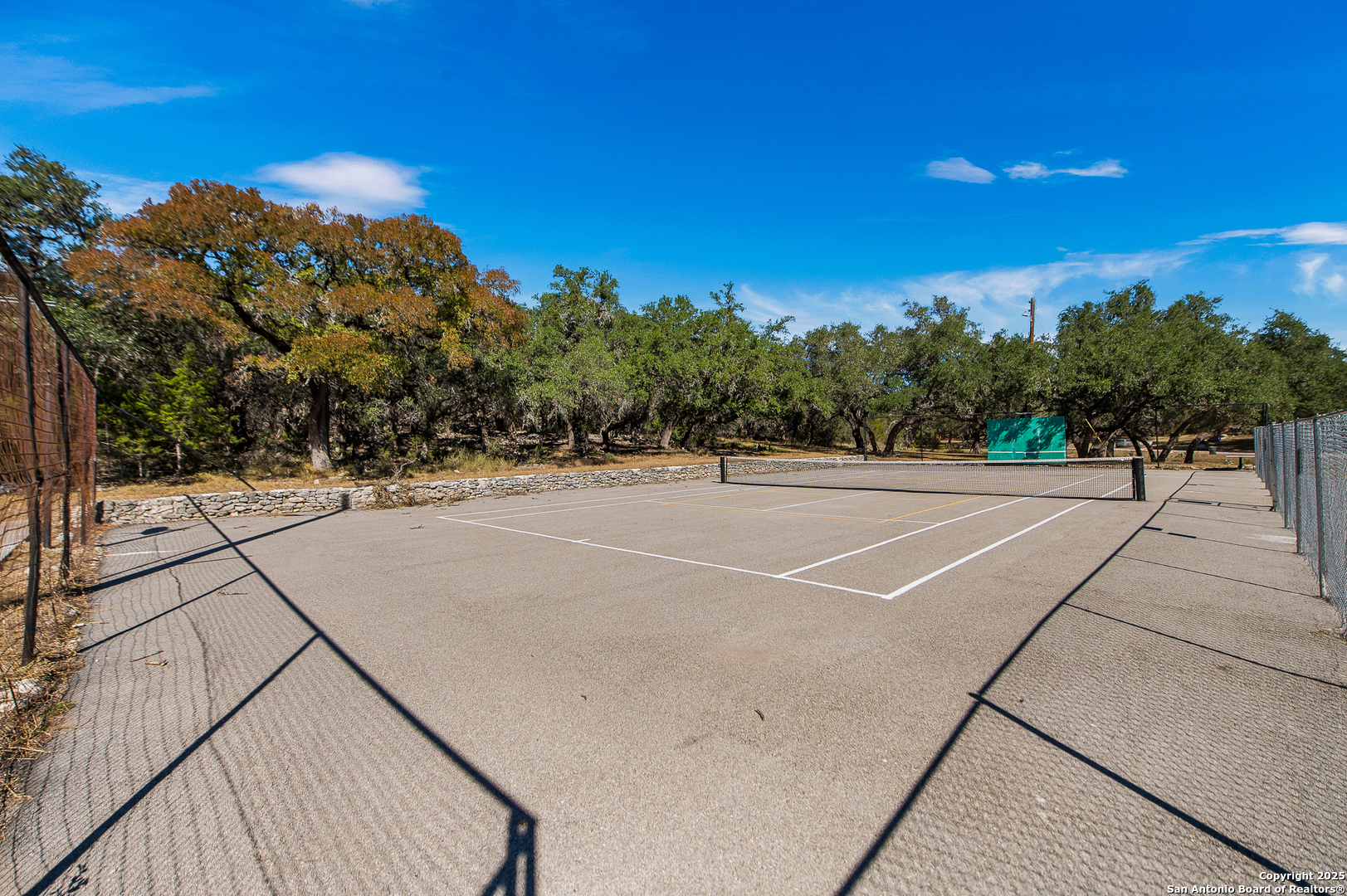 1230 Echo Meadow Lane Spring Branch, TX 78070 - Photo 26 of 31 a view of a tennis court