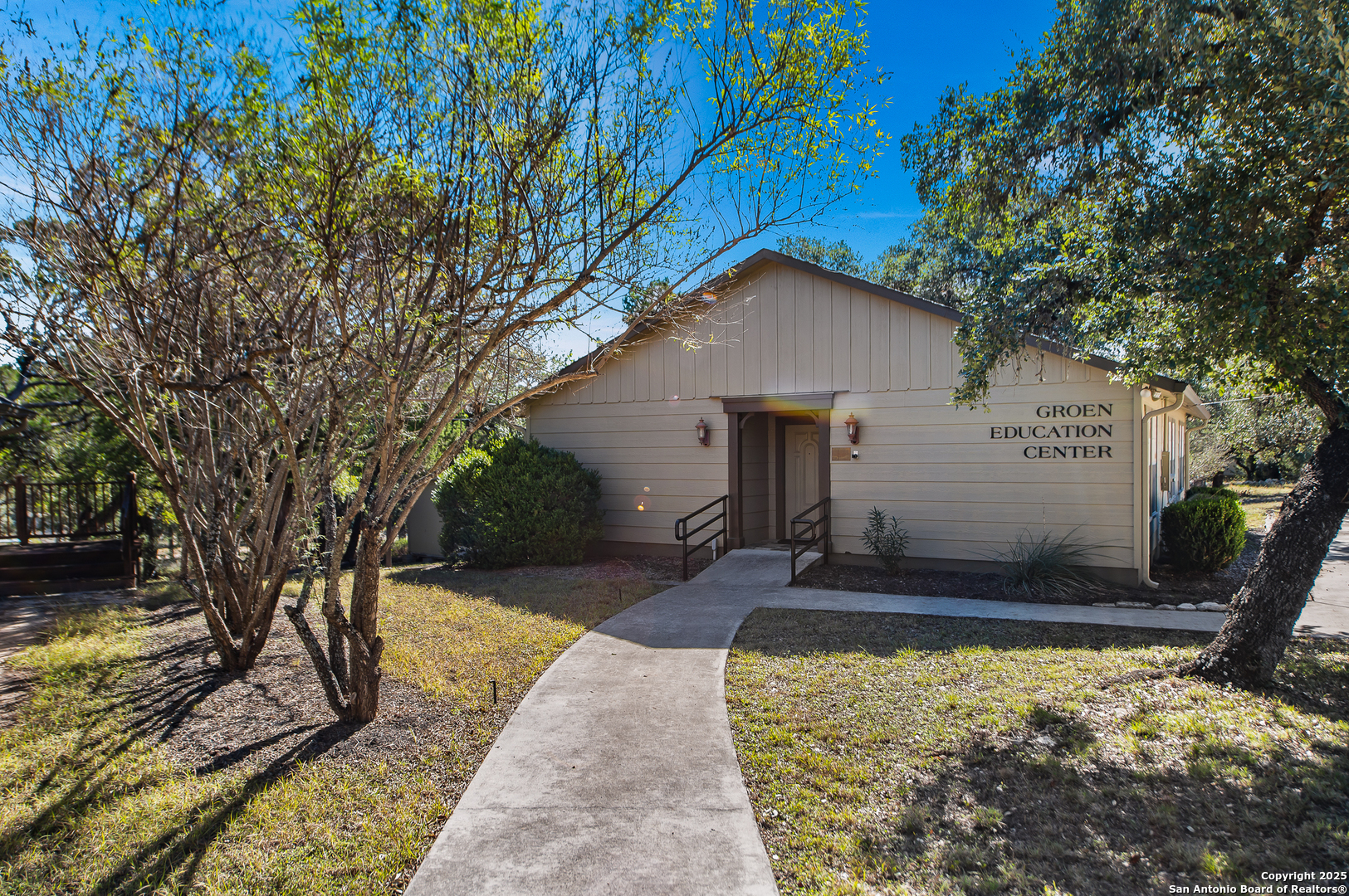 1230 Echo Meadow Lane Spring Branch, TX 78070 - Photo 30 of 31 a front view of a house with a yard