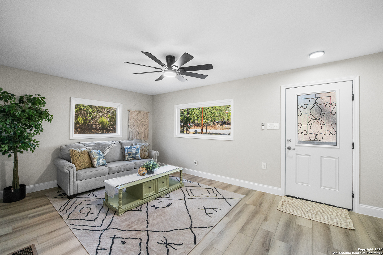 1230 Echo Meadow Lane Spring Branch, TX 78070 - Photo 4 of 31 a living room with furniture and a large window