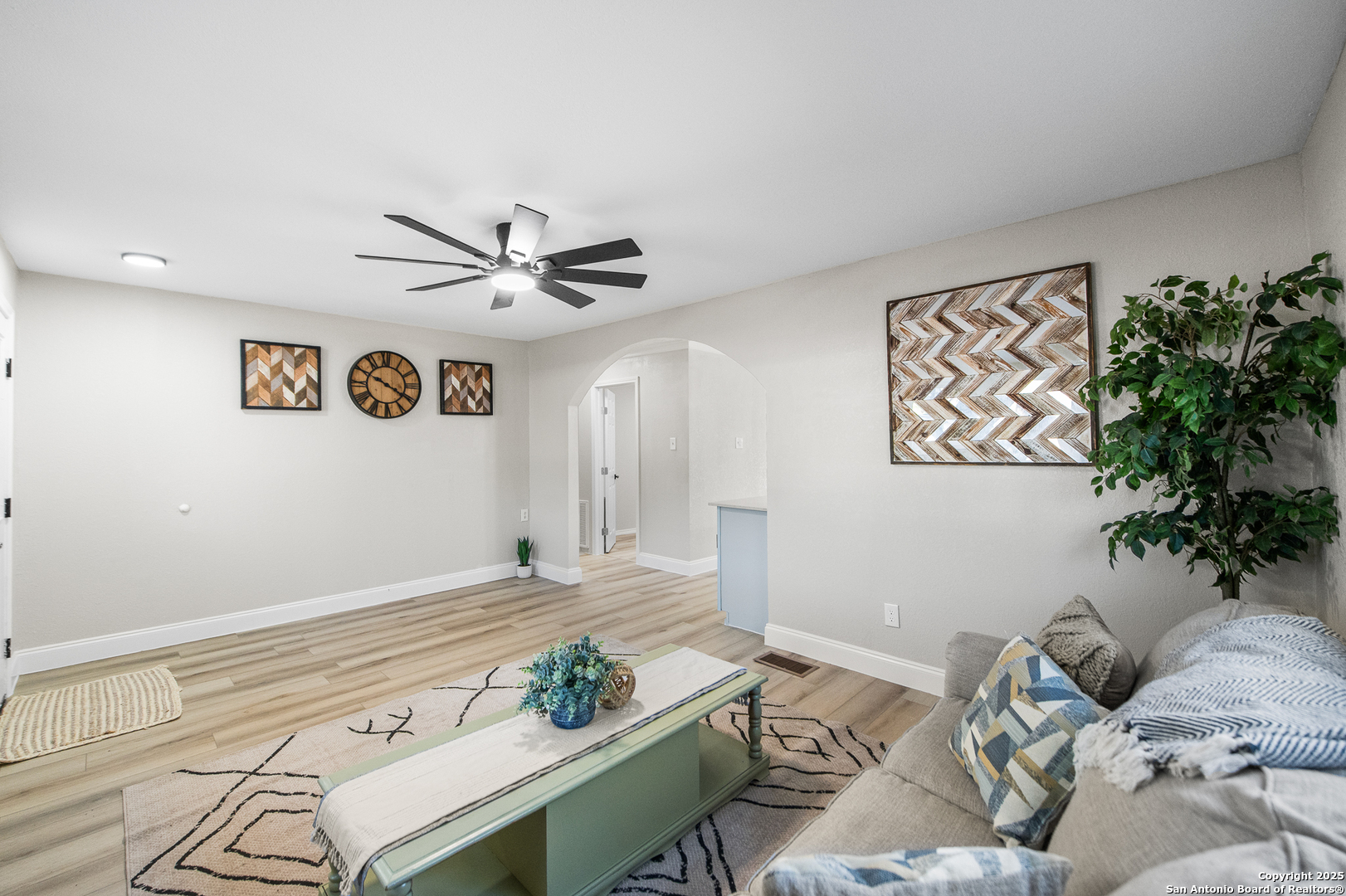 1230 Echo Meadow Lane Spring Branch, TX 78070 - Photo 5 of 31 a living room with furniture and wall paintings