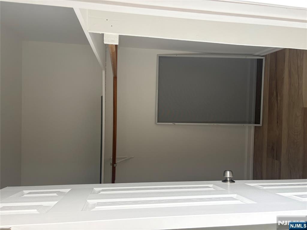 70 Pink Street, Unit 2 Hackensack, NJ 07601 - Photo 10 of 13 a view of small space with wooden floor and closet