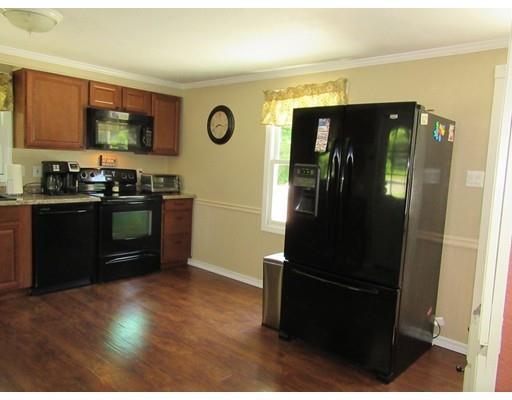 113 Draper Road East Brookfield, MA 01515 - Photo 11 of 33 a kitchen with stainless steel appliances granite countertop a refrigerator a stove and a sink