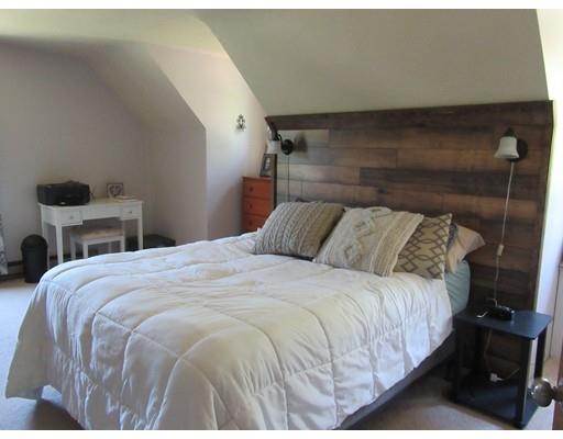 113 Draper Road East Brookfield, MA 01515 - Photo 17 of 33 a bedroom with a bed and wooden floor