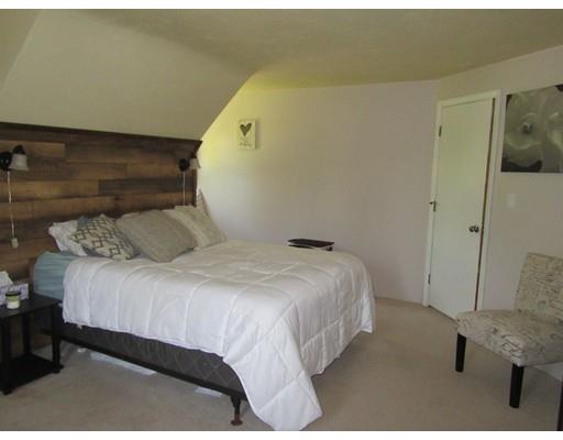 113 Draper Road East Brookfield, MA 01515 - Photo 19 of 33 a bedroom with a bed and wooden floor