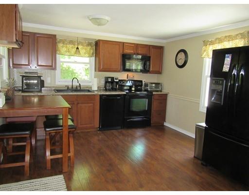 113 Draper Road East Brookfield, MA 01515 - Photo 9 of 33 a kitchen with stainless steel appliances granite countertop a refrigerator stove top oven and sink